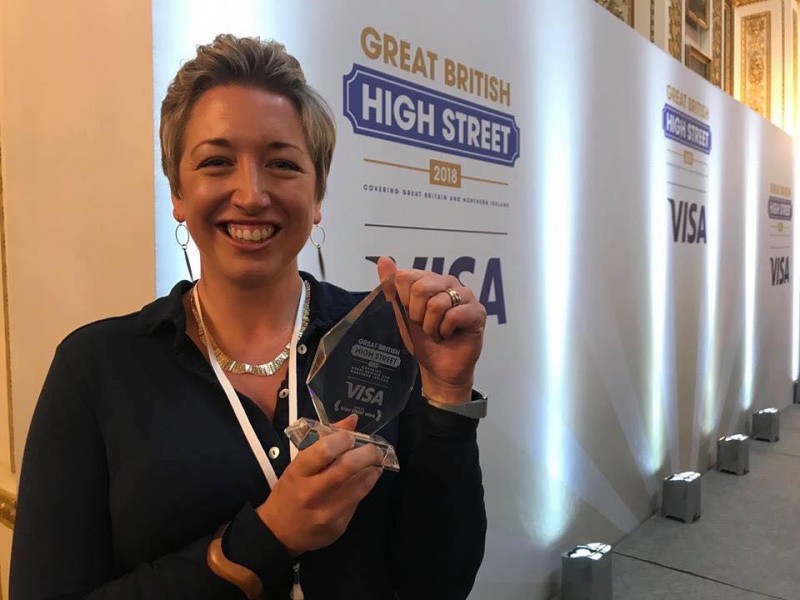 Emma accepting her GBHS High Street Hero Award