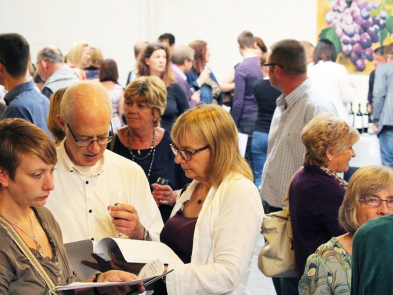 Hundreds of Newark customers flock to the Ann et Vin Wine Tastings.